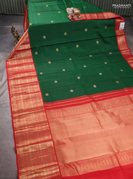 Pure kanchipuram silk saree bottle green and red with zari woven buttas and long zari woven korvai border