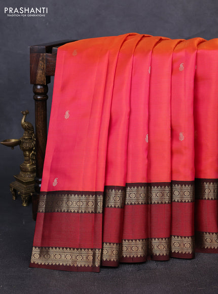Pure kanchipuram silk saree dual shade of pinkish orange and coffee brown with allover vairaosi pattern & buttas and zari woven korvai border