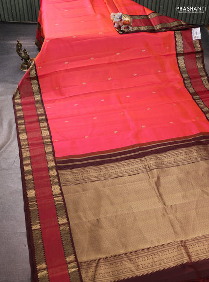 Pure kanchipuram silk saree dual shade of pinkish orange and coffee brown with allover vairaosi pattern & buttas and zari woven korvai border
