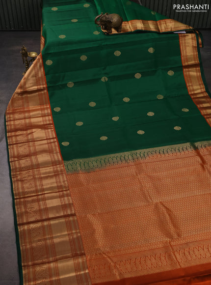 Pure kanchipuram silk saree green and rustic orange with zari woven buttas and long rich zari woven border