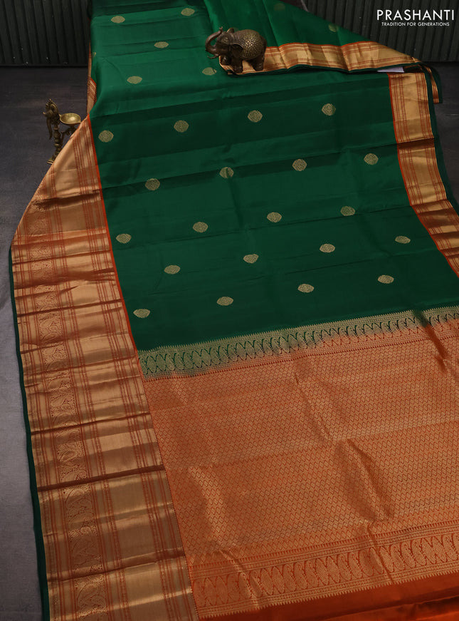 Pure kanchipuram silk saree green and rustic orange with zari woven buttas and long rich zari woven border