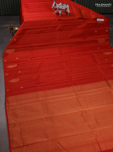Pure kanchipuram silk saree orange with allover zari woven buttas and zari woven butta border