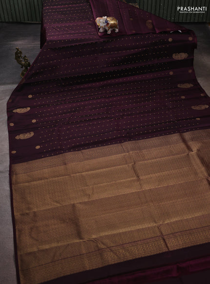 Pure kanchipuram silk saree jamun shade with allover zari woven buttas and zari woven butta border