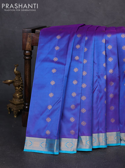 Pure kanchipuram silk saree dual shade of violet and teal blue with allover zari woven buttas and zari woven border