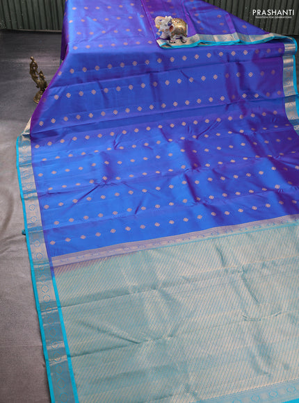 Pure kanchipuram silk saree dual shade of violet and teal blue with allover zari woven buttas and zari woven border