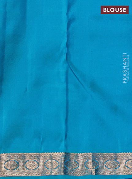 Pure kanchipuram silk saree dual shade of violet and teal blue with allover zari woven buttas and zari woven border