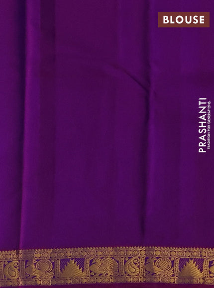 Pure kanchipuram silk saree dual shade of bluish green and purple with zari woven buttas and zari woven border
