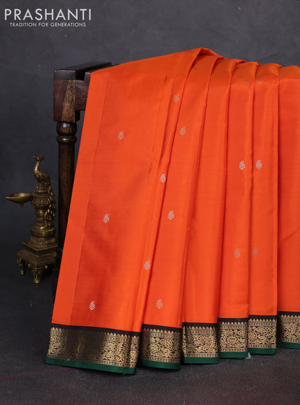 Pure kanchipuram silk saree orange and coffee brown with zari woven buttas and zari woven korvai border
