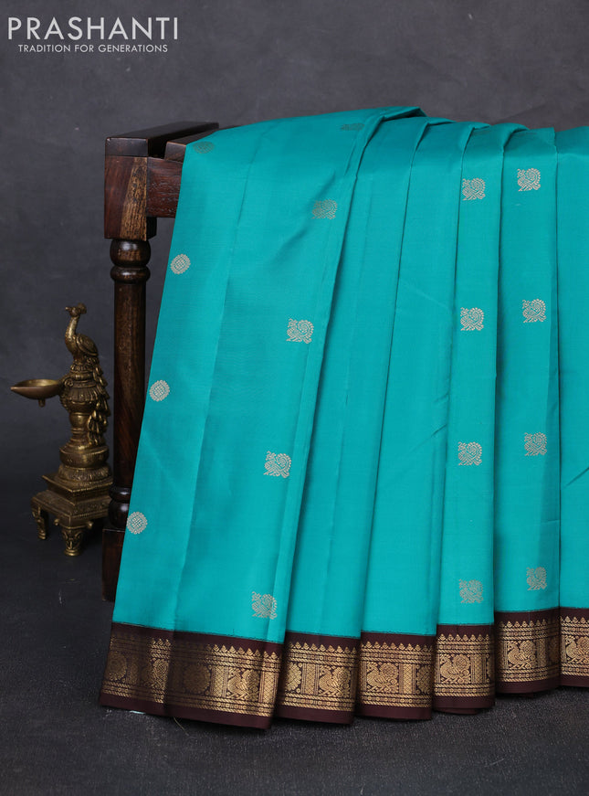 Pure kanchipuram silk saree teal blue and coffee brown with zari woven buttas and zari woven korvai border