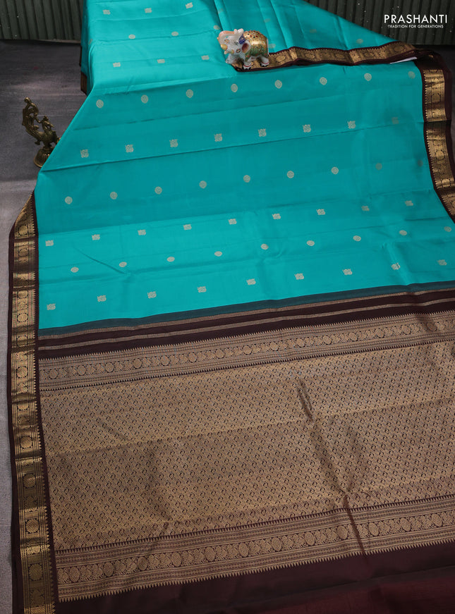 Pure kanchipuram silk saree teal blue and coffee brown with zari woven buttas and zari woven korvai border