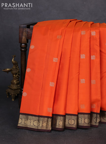 Pure kanchipuram silk saree orange and coffee brown with zari woven buttas and zari woven korvai border