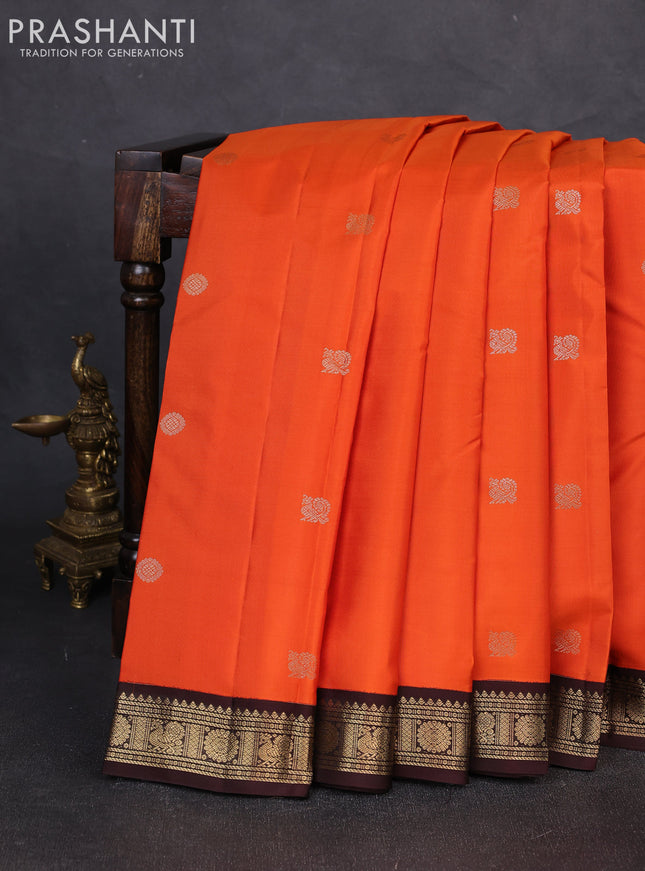 Pure kanchipuram silk saree orange and coffee brown with zari woven buttas and zari woven korvai border