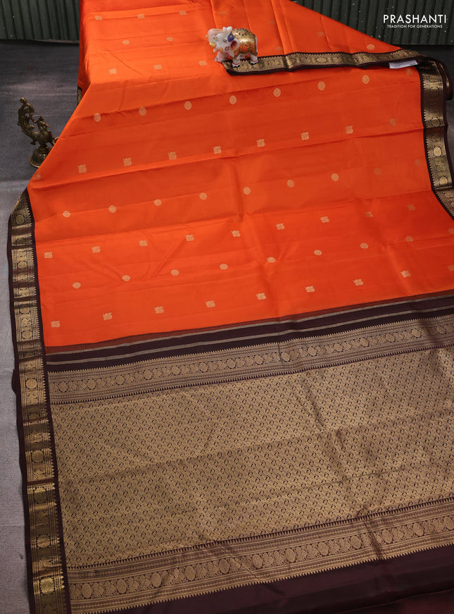 Pure kanchipuram silk saree orange and coffee brown with zari woven buttas and zari woven korvai border