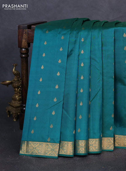 Pure kanchipuram silk saree teal green shade with allover zari woven buttas and zari woven border