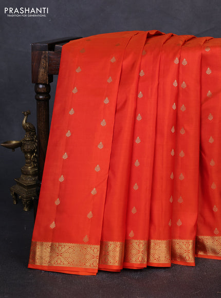 Pure kanchipuram silk saree orange with allover zari woven buttas and zari woven border