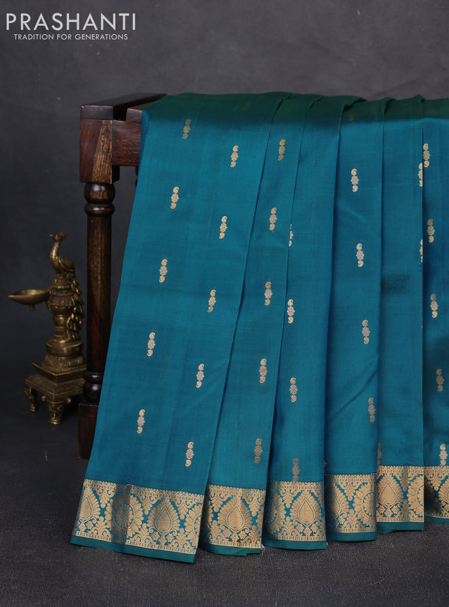 Pure kanchipuram silk saree teal green shade with allover zari woven buttas and zari woven border