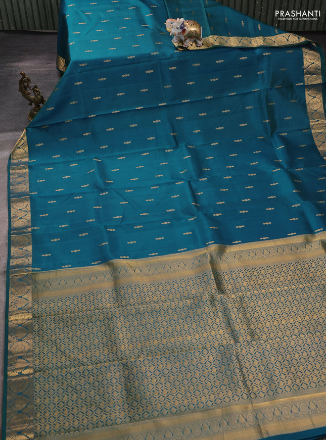 Pure kanchipuram silk saree teal green shade with allover zari woven buttas and zari woven border