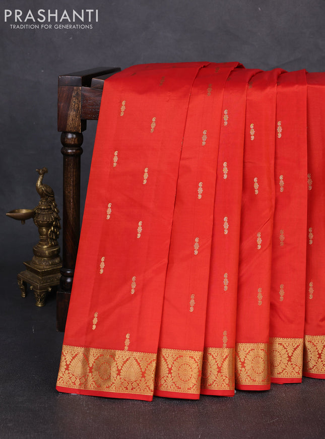 Pure kanchipuram silk saree orange with allover zari woven buttas and zari woven border
