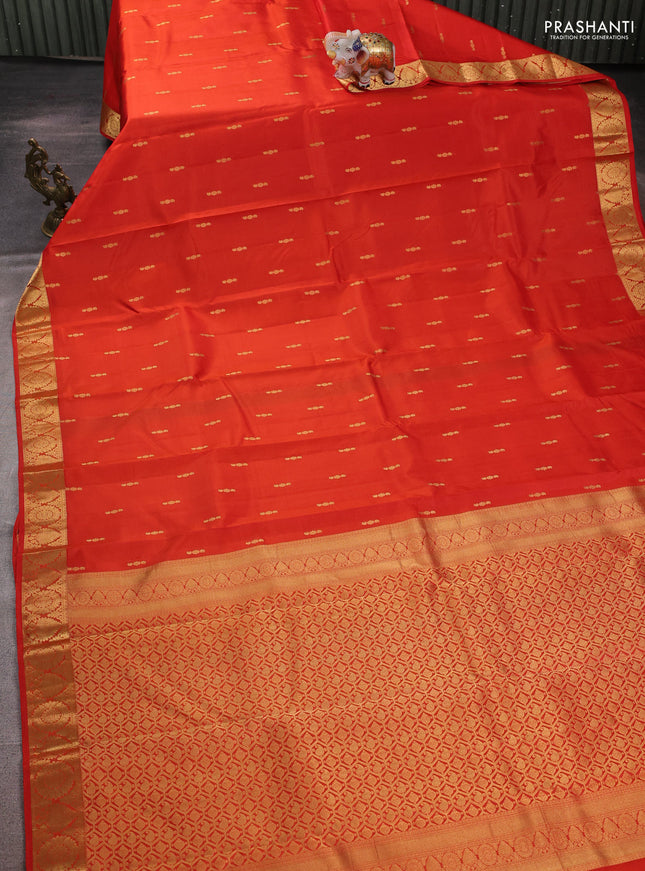 Pure kanchipuram silk saree orange with allover zari woven buttas and zari woven border