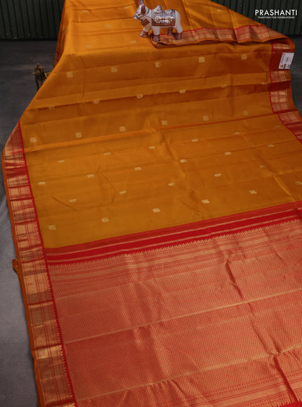 Pure kanchipuram silk saree dark mustard and red with zari woven buttas and zari woven korvai border