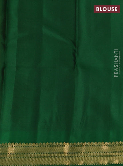 Pure kanchipuram silk saree yellow and green with zari woven buttas and temple design zari woven korvai border
