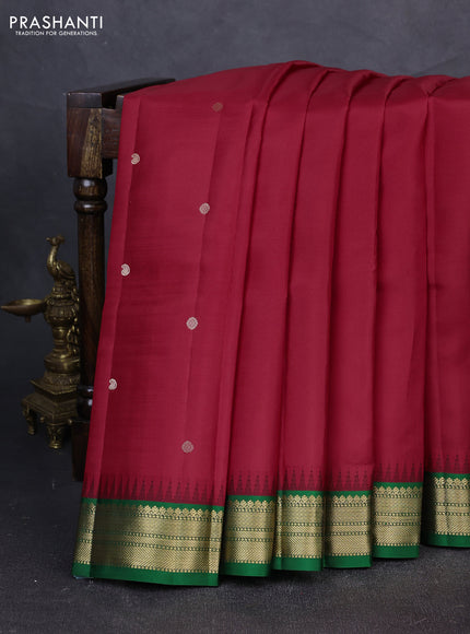 Pure kanchipuram silk saree red and green with zari woven buttas and temple design zari woven korvai border