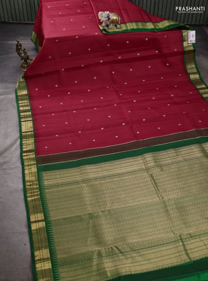 Pure kanchipuram silk saree red and green with zari woven buttas and temple design zari woven korvai border