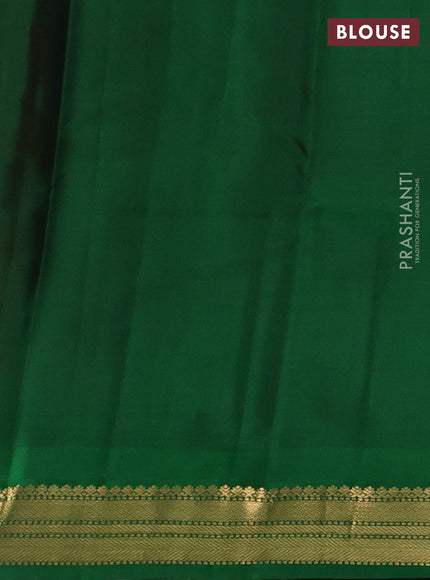 Pure kanchipuram silk saree red and green with zari woven buttas and temple design zari woven korvai border