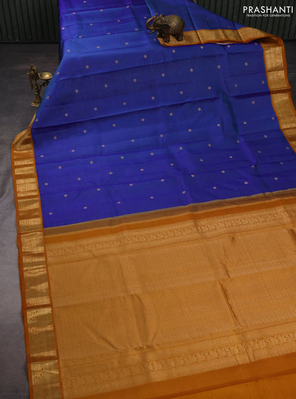 Pure kanchipuram silk saree dual shade of blue and dark mustard with allover vairaosi pattern & buttas and zari woven korvai border