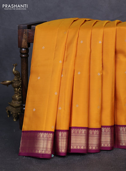 Pure kanchipuram silk saree mustard yellow and purple with zari woven buttas and zari woven korvai border