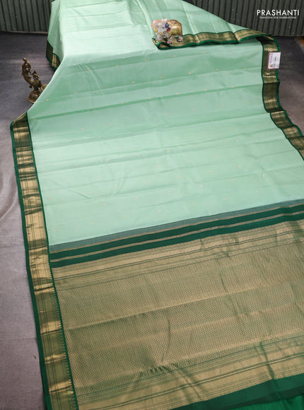 Pure kanchipuram silk saree teal green shade and green with zari woven buttas and zari woven korvai border