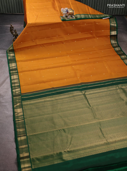 Pure kanchipuram silk saree dark mustard and green with zari woven buttas and zari woven korvai border