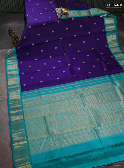 Pure kanchipuram silk saree blue and teal blue with zari woven buttas and zari woven korvai border