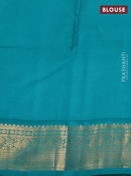 Pure kanchipuram silk saree blue and teal blue with zari woven buttas and zari woven korvai border