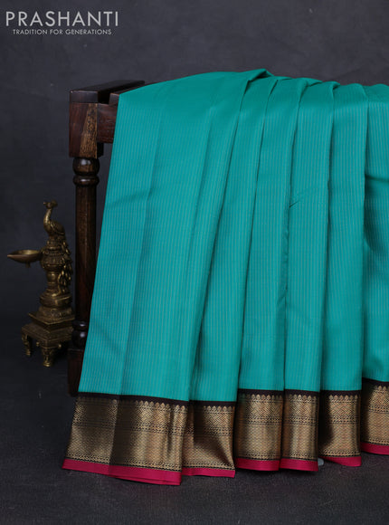 Pure kanchipuram silk saree teal blue and coffee brown with allover zari stripe pattern and zari woven korvai border