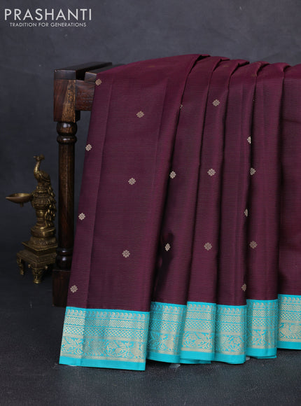 Pure kanchipuram silk saree deep purple and teal blue with allover vairaosi pattern & buttas and zari woven korvai border