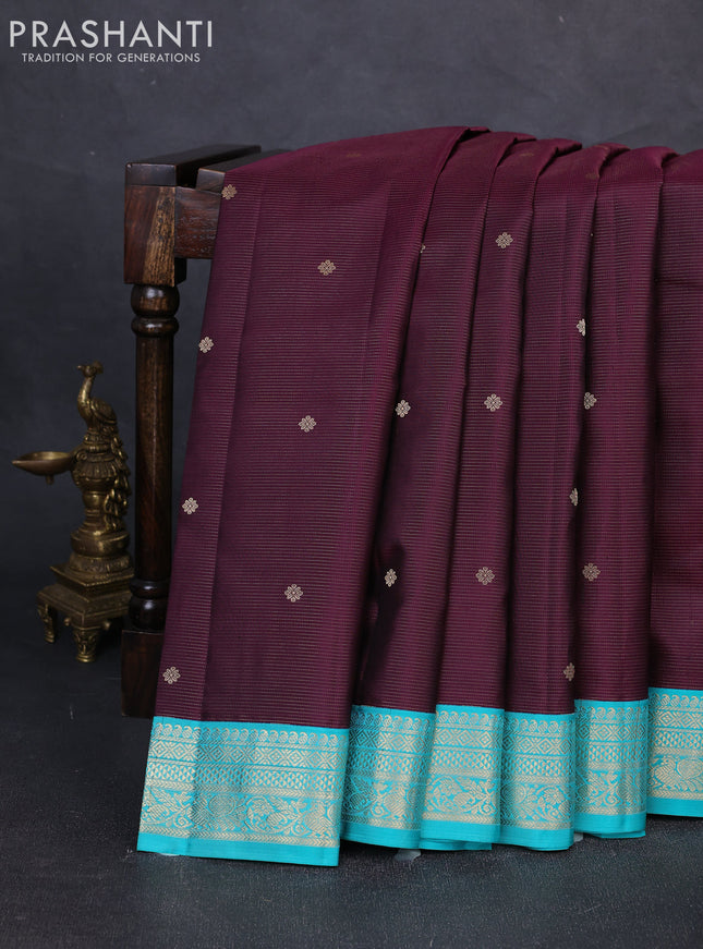 Pure kanchipuram silk saree deep purple and teal blue with allover vairaosi pattern & buttas and zari woven korvai border