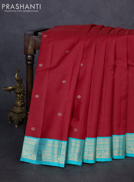 Pure kanchipuram silk saree red and teal blue with allover vairaosi pattern & buttas and zari woven korvai border