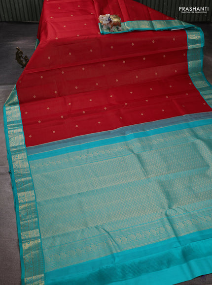 Pure kanchipuram silk saree red and teal blue with allover vairaosi pattern & buttas and zari woven korvai border