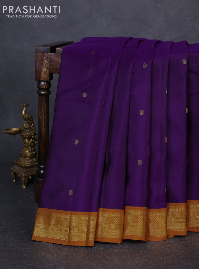 Pure kanchipuram silk saree purple and dark mustard with zari woven buttas and zari woven korvai border