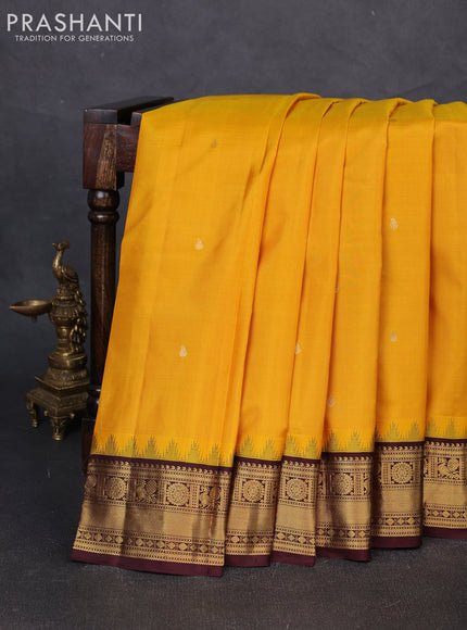 Pure kanchipuram silk saree mustard yellow and brown with zari woven buttas and zari woven border