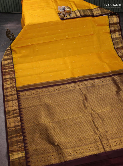 Pure kanchipuram silk saree mustard yellow and brown with zari woven buttas and zari woven border