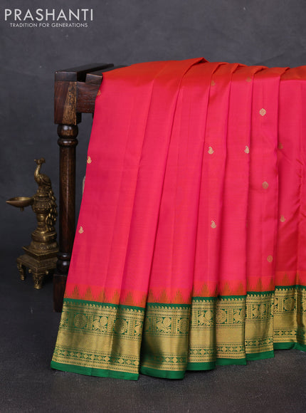 Pure kanchipuram silk saree dual shade of pinkish orange and green with zari woven buttas and zari woven border
