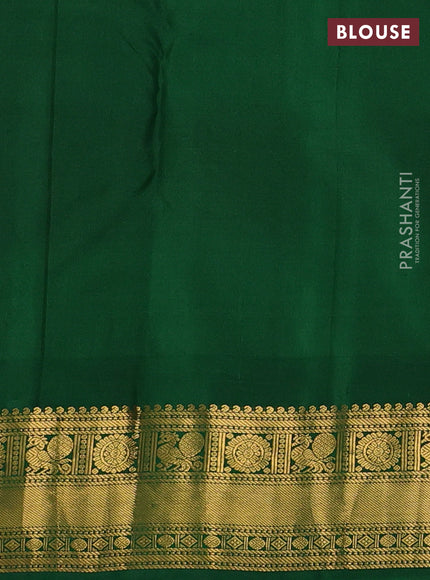 Pure kanchipuram silk saree dual shade of pinkish orange and green with zari woven buttas and zari woven border