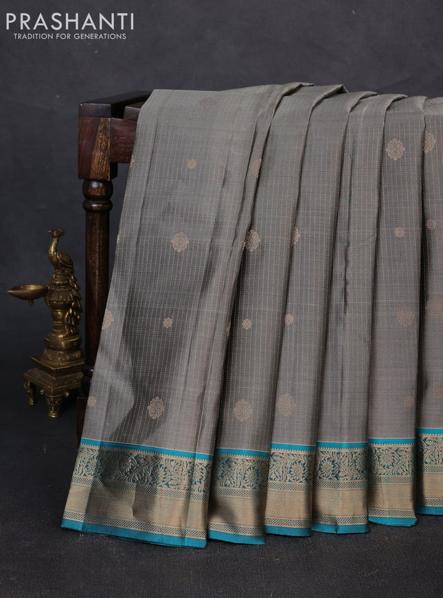 Pure kanchipuram silk saree grey and teal blue with allover zari weaves and zari woven border