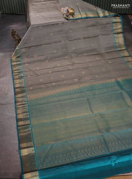 Pure kanchipuram silk saree grey and teal blue with allover zari weaves and zari woven border