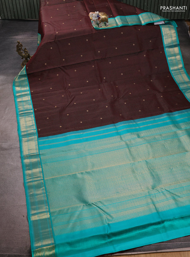 Pure kanchipuram silk saree coffee brown and teal blue with allover zari weaves and zari woven korvai border