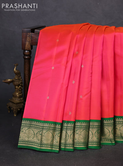 Pure kanchipuram silk saree pinkish orange and green with zari woven paisley buttas and zari woven korvai border