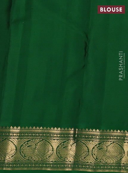 Pure kanchipuram silk saree pinkish orange and green with zari woven paisley buttas and zari woven korvai border
