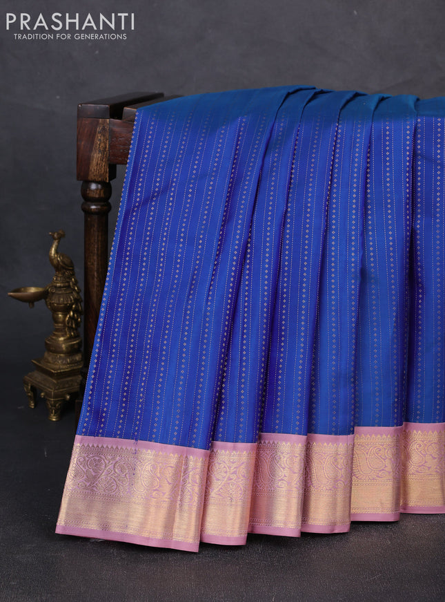 Pure kanchipuram silk saree blue and pastel pink with allover zari weaves and zari woven korvai border